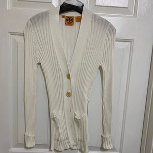 White Tory Burch sweater.